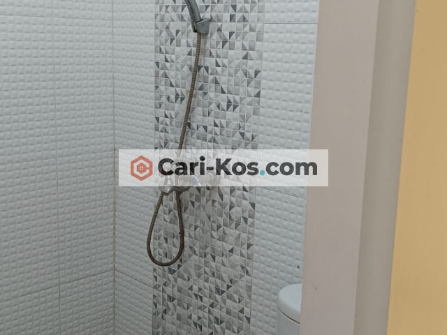 Nine Suites 9 Kos Fasilitas Lengkap Taman Bunga Merak 1